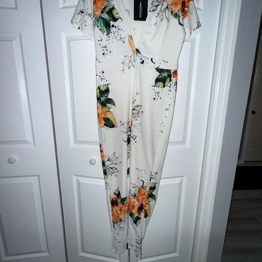 PrettyLittleThing Floral Jumpsuit in Cream and Orange